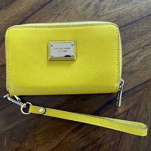 Yellow Michael Kors wristlet wallet